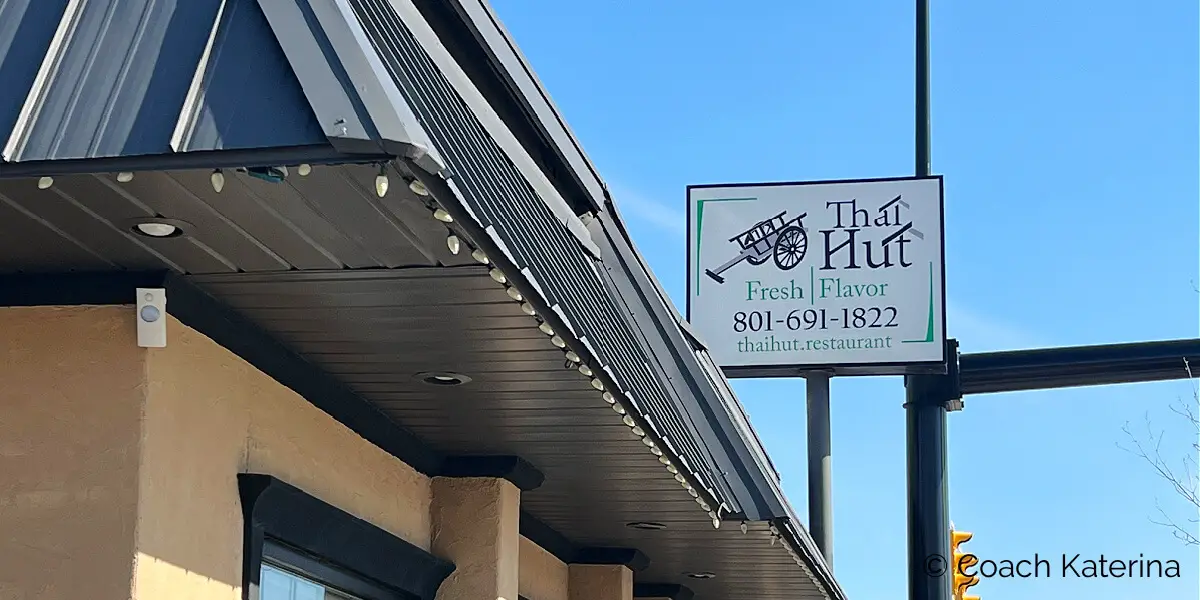 A signboard photo of Thai Hut Restaurant where we found authentic Thai cuisines upon driving in Provo