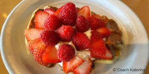 Photo of waffles topped with strawberries served at Waffle Love in Provo Utah