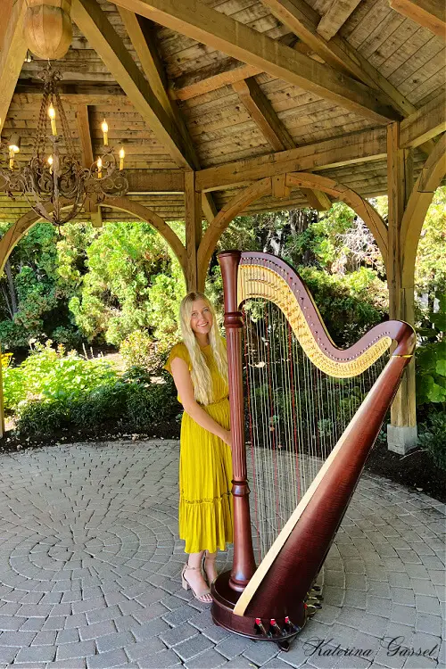 A photo I took of Chloe Jacobs and her harp. Hiring a harpist is perfect for making important events more special