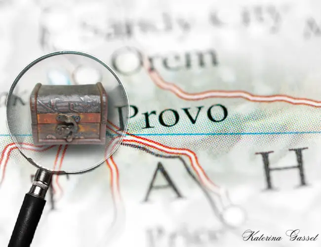 Photo showing the map of Provo with a magnifying glass showing a treasure