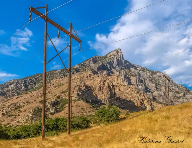 A photo of the Provo Mountains with electricity lines.