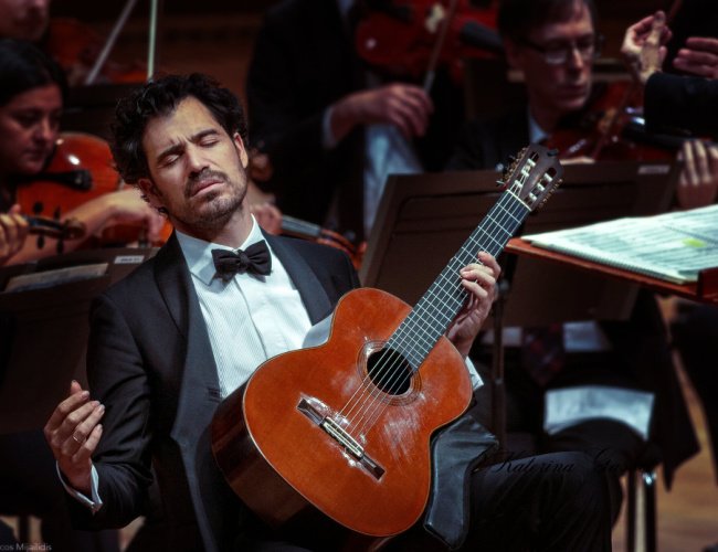 Renowned guitarist Pablo Sáinz-Villegas performing at Brigham Young University (BYU) in Provo, Utah, delivering mesmerizing melodies.