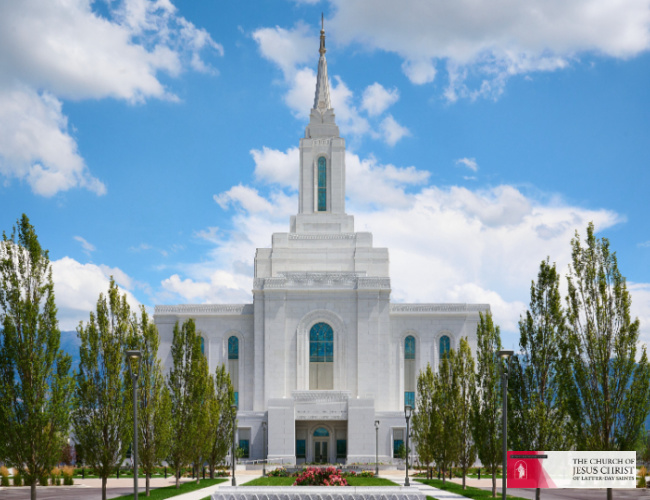 The new LDS Temple in Orem Utah featuring white stone architecture and art glass...