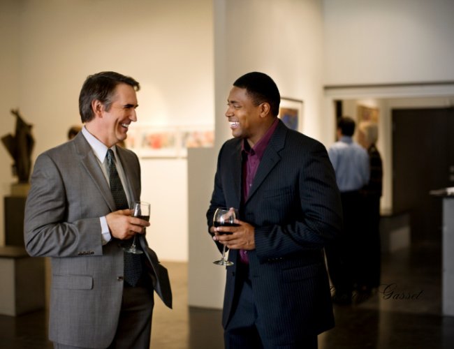 Art After Dark - The MOA Gala at BYU Museum of Art in Provo, Utah, featuring elegant evening attire, art exhibits, and a sophisticated ambiance.