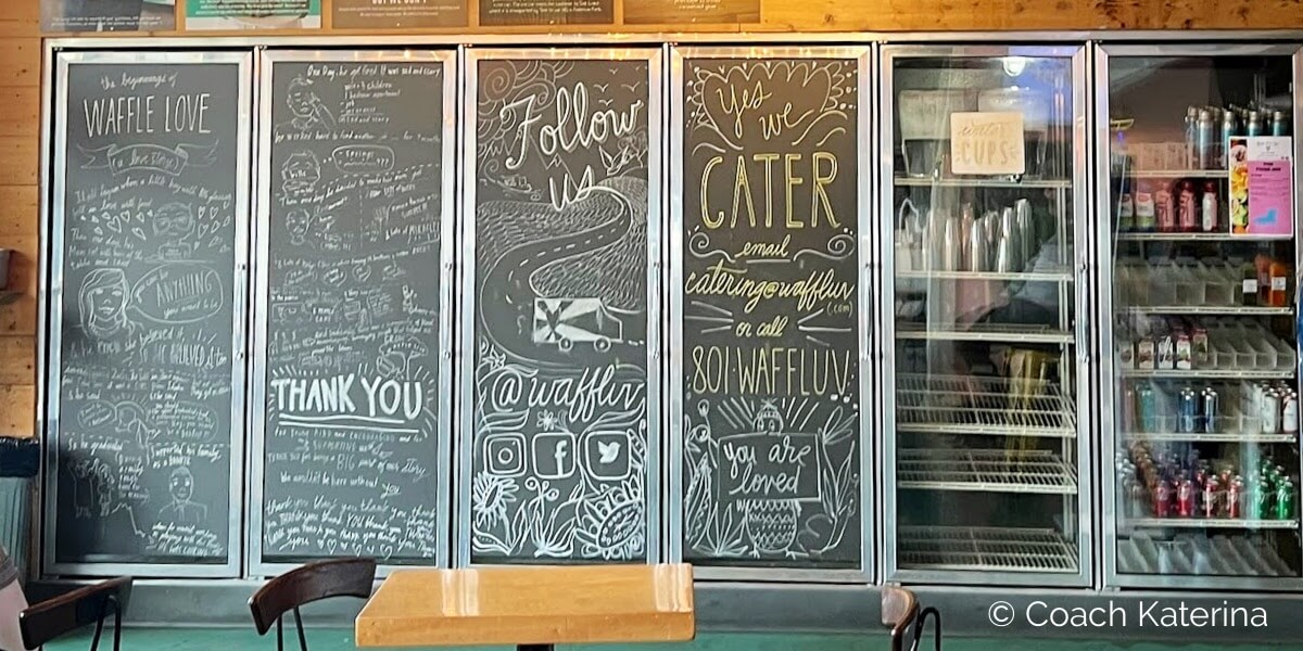 Menu Board with Chalk Writings at Waffle Love Food Truck in State Street Provo Utah. Image by Katerina Gasset and Tristan Gasset, licensed Realtors in Utah brokered by eXp Realty...