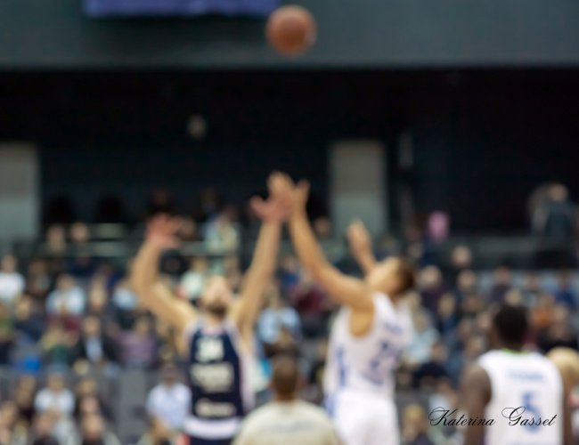 BYU Men's Basketball game against UCF at Brigham Young University in Provo, Utah, featuring action-packed gameplay, athletes in motion, and a vibrant crowd cheering.