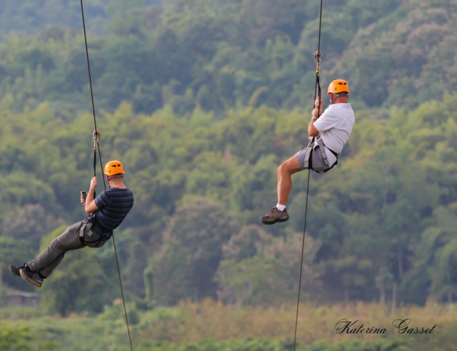 Love is in the Air Zip Tour in Provo, Utah, featuring couples enjoying a romantic zipline adventure with scenic views of the surrounding landscape.