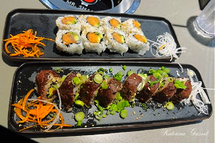 Photo of trays of sushi served at Mr. Shabu Hotpot and Sushi Restaurant located in Orem Utah, near Provo. Image by Katerina Gasset of the Gasset Group Real Estate Team, owner and author of the Move to Provo Utah website...