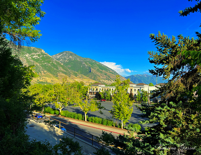 Image showing Brigham Young University with a vibrant neighborhood and the Y Mountains in the background. Photo taken by Katerina Gasset of the Gasset Group Real Estate Team brokered by eXp Realty in Utah...