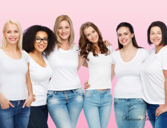 Attendees dressed in pink enjoying the Provo Women's Day Barbie Bash in Provo, Utah, celebrating female empowerment and community.