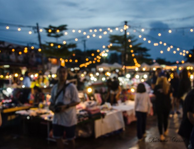 Visitors enjoying Sundance Harvest Market 2024 with booths, crafts, and local produce